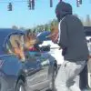 This Man Jumped Out of His Car with a Puppy to Say Hi to the Puppy in the Car Next to Them