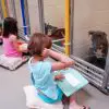 Kids Practice Reading to Shy Shelter Dogs at the Missouri Humane Society