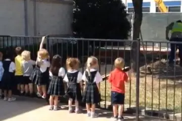 Enjoyable: Kids Cheer on the School Worker Every Time He Shovels some Dirt (the Encouragement We All Need!)